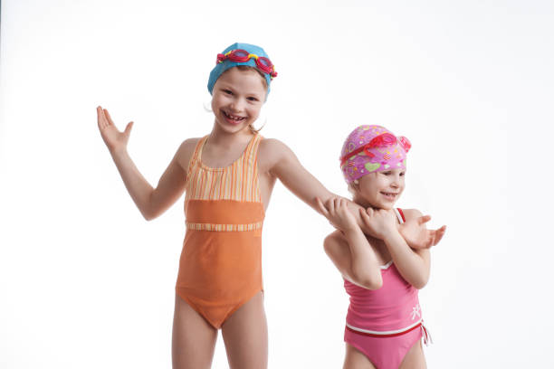 istock Two girls in swimming suits 674675188