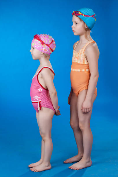 istock Two girls in swimming suits 674675202