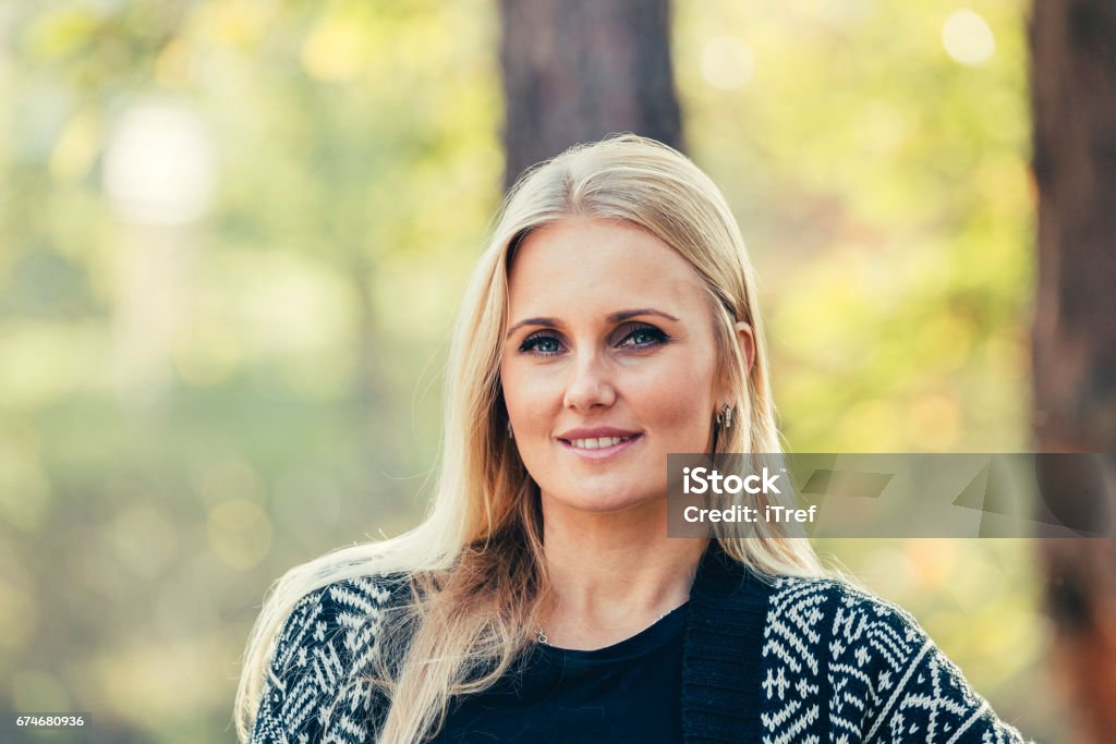Portrait of Young Attractive Woman Portrait of young beaurtiful girl outdoors in park. 20-29 Years Stock Photo