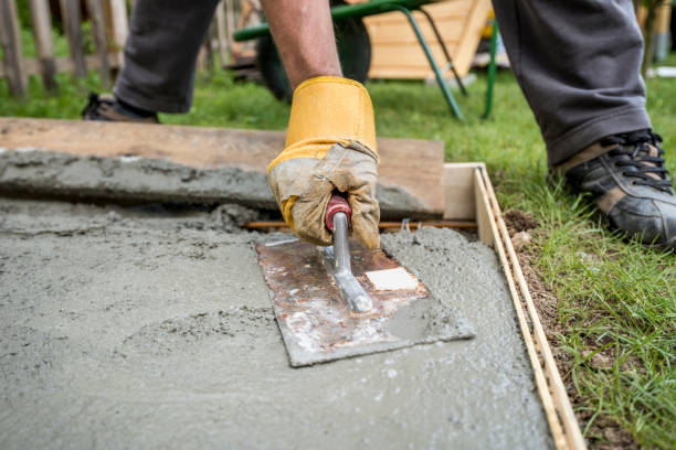 istock Close up on paver smoothing fresh concrete 674684720