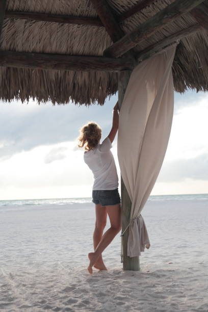 istock Woman on a beach. 674693930