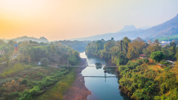 istock suspension bridge  across Kwai river 674694530