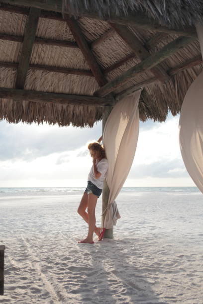 istock Woman on a beach. 674694554