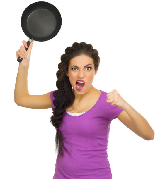 istock Angry woman with pan 674694686