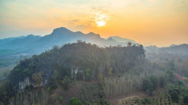 istock suspension bridge  across Kwai river 674697990