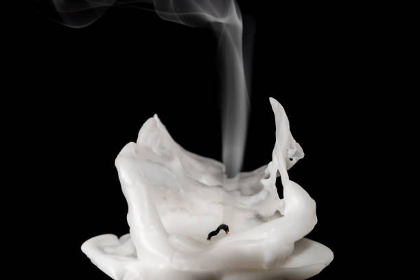istock Closeup of white blown out and smoking candle 674701536