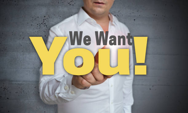 istock We Want You touchscreen is operated by man 674707796