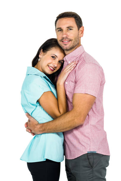 istock Smiling couple hugging and looking at camera 674717140
