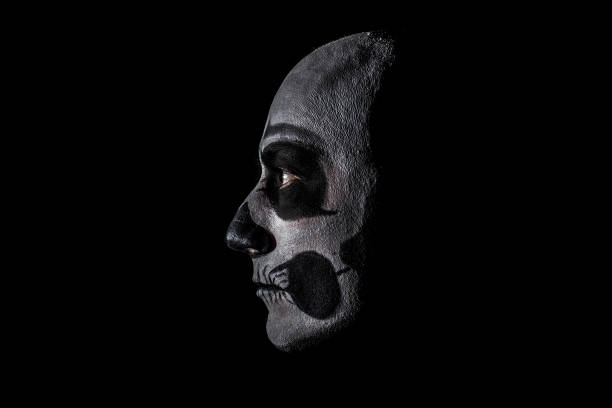 istock Beautiful man with creative make-up for the Halloween party 674720740