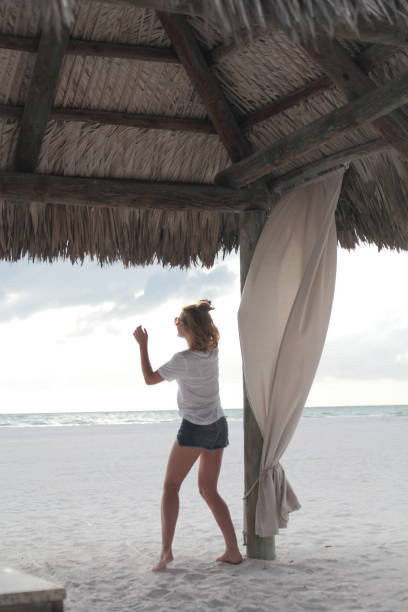 istock Woman on a beach. 674730188