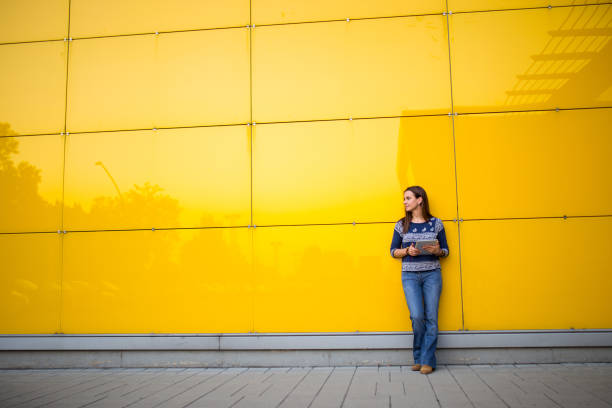 istock Shopping with tablet outdoors 674739412
