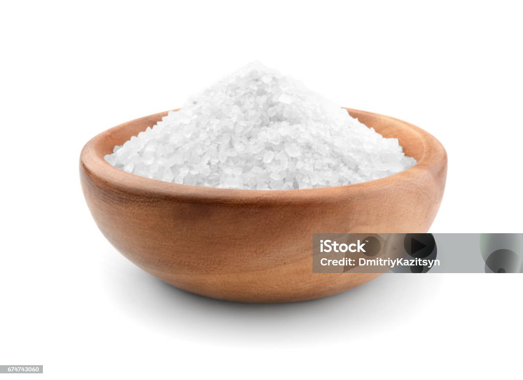 Salt wooden bowl Salt wooden bowl isolated on white Salt - Mineral Stock Photo