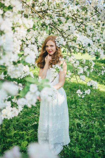 istock A girl in an apple orchard 674743198