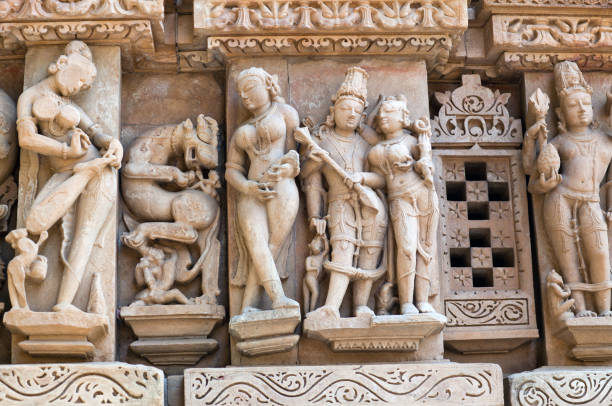 istock Bas relief at famous ancient temple in Khajuraho, India 674749730