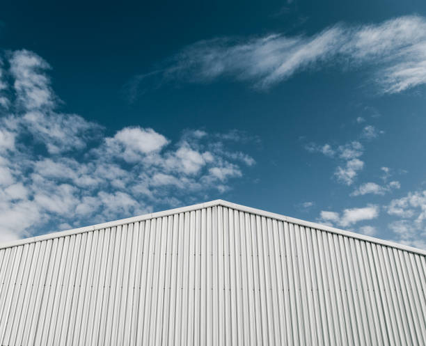 istock Industrial building with corrugated sheet metal facade 674756584