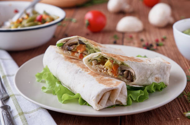 istock Burito with chicken mushrooms and vegetables 674765614