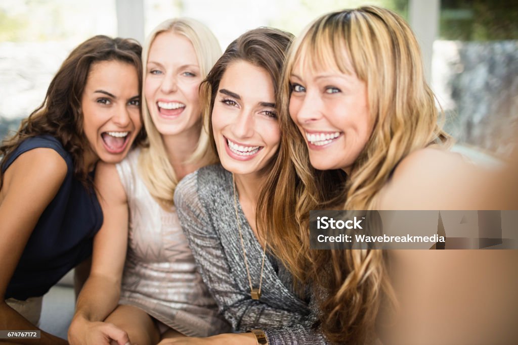 Group of beautiful women having fun Portrait of beautiful women having fun at party Women Stock Photo