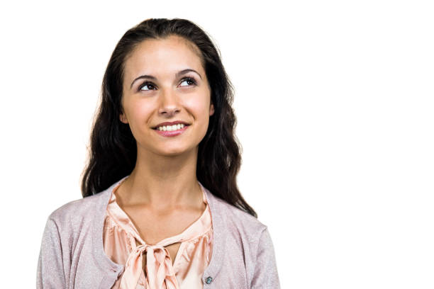 istock Smiling woman looking up 674772858