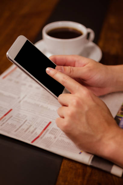 istock Close-up of woman using a smartphone 674772982