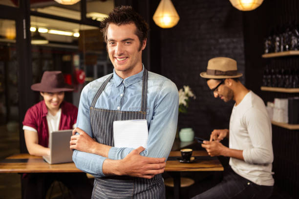 istock Waiter with arms crossed 674775782