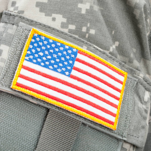 istock Close up studio shot of U.S. flag patch on solders uniform 674775936