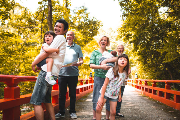 istock Mixed race family lost in the park 674782006
