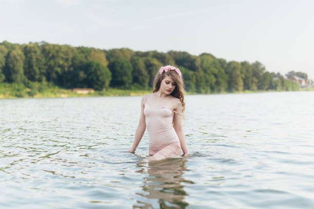 istock girl in river 674787198