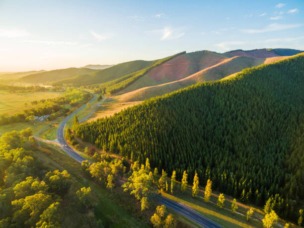 istock Winding road passing through beautiful Australian countryside at sunset 674792604