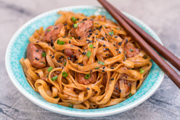istock Stir Fried noodle with pork in soy sauced 674792858