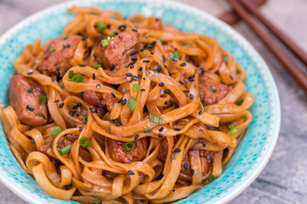 istock Stir Fried noodle with pork in soy sauced 674792878