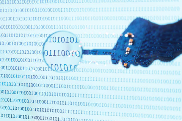 istock CPU circuit with hand with magnifier glass 674792948