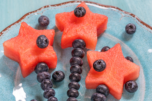 Watermelon stars with blueberry on a stick