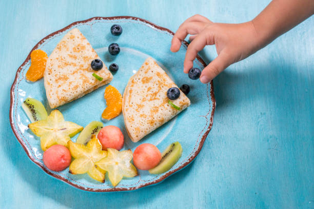 istock Funny crepes pancakes looks like a fish 674793160