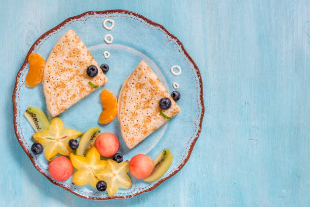 Funny crepes pancakes looks like a fish