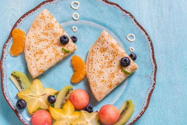 istock Funny crepes pancakes looks like a fish 674793190