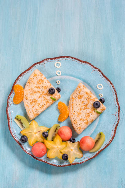 istock Funny crepes pancakes looks like a fish 674793228