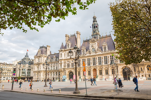 Paris, France - October 18, 2016: Hotel de Ville with unidentified people. It is the city hall of Paris. It has been the headquarters of the municipality of Paris since 1357