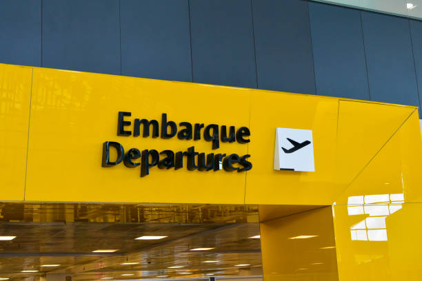 istock Check in, Airport Departure information board sign 674800078