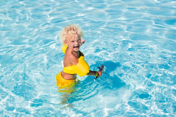 istock Little boy in swimming suit 674800234