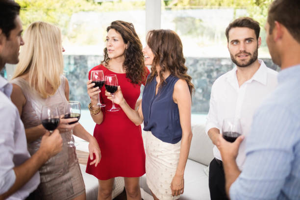 istock Group of friends having wine 674803932