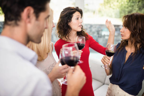 istock Group of friends having wine 674803960