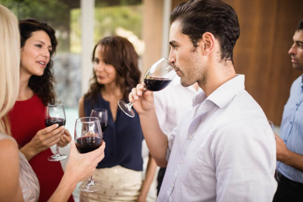Group of friends having wine