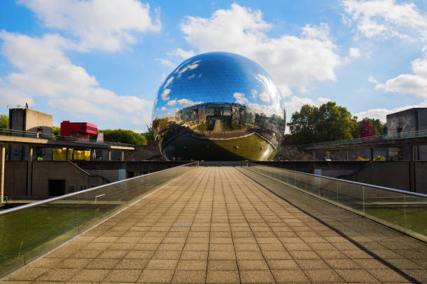 La Geode in the Parc de la Villette in Paris Paris, France - October 15, 2016: La Geode in the Parc de la Villette with unidentified people. Its a mirror-finished geodesic dome with an Omnimax theatre at the Cite des Sciences et de l Industrie la geode stock pictures, royalty-free photos & images