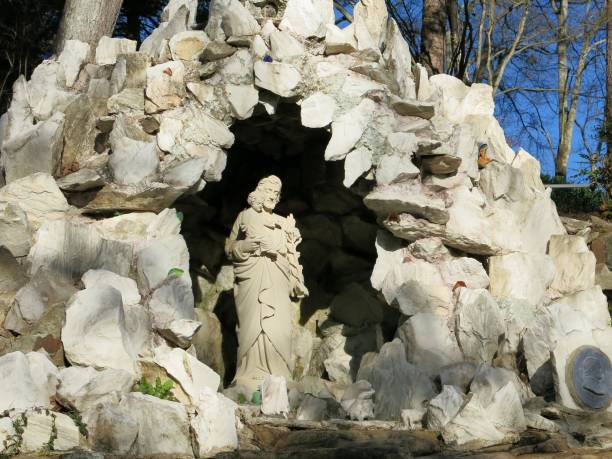 Saint Joseph holding Baby Jesus in Stone Grotto