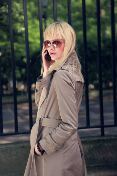 istock blond woman with sun glasses 674833288