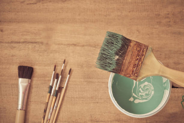 istock paint brush and color on wood 674854518