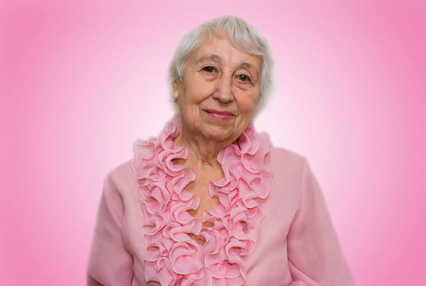 istock Smiling pensive senior woman 674864164