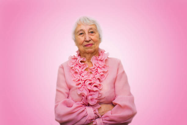istock Smiling pensive senior woman 674864224