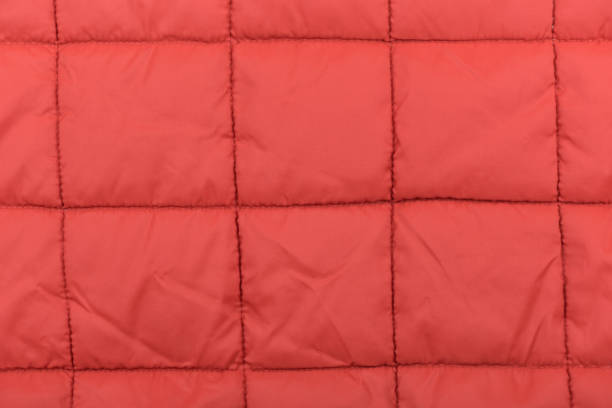 istock Red fabric background in close up. 674873436