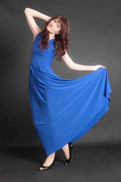 istock woman in a blue dress 674873610